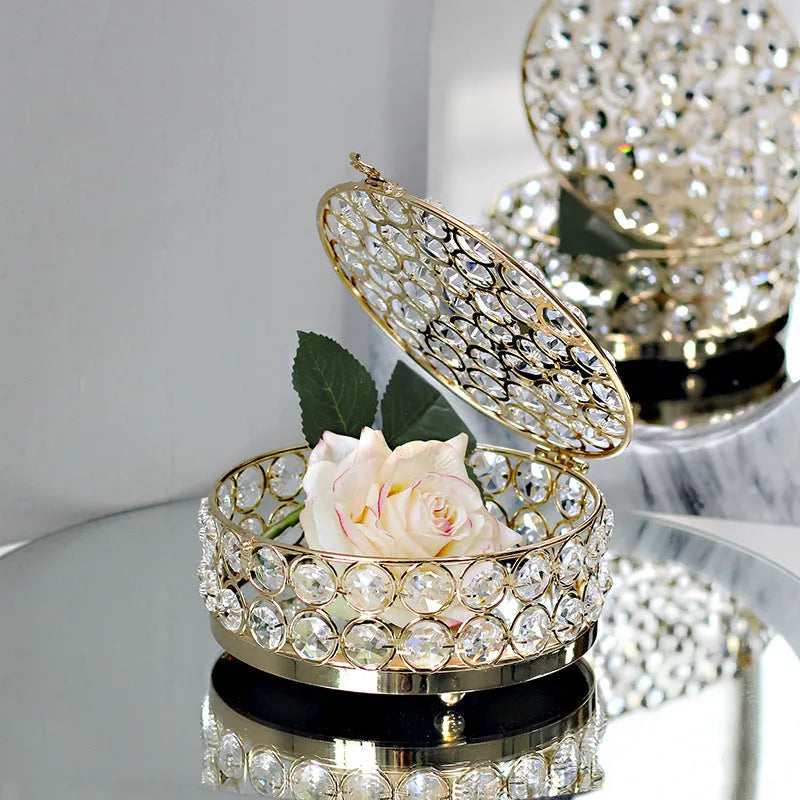 French gold metal frame jewellery box with transparent crystal glass panels displaying contents