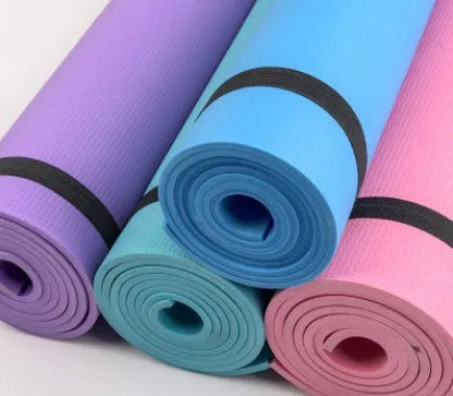 EVA fitness yoga mat in red showing textured anti-skid surface with storage bag