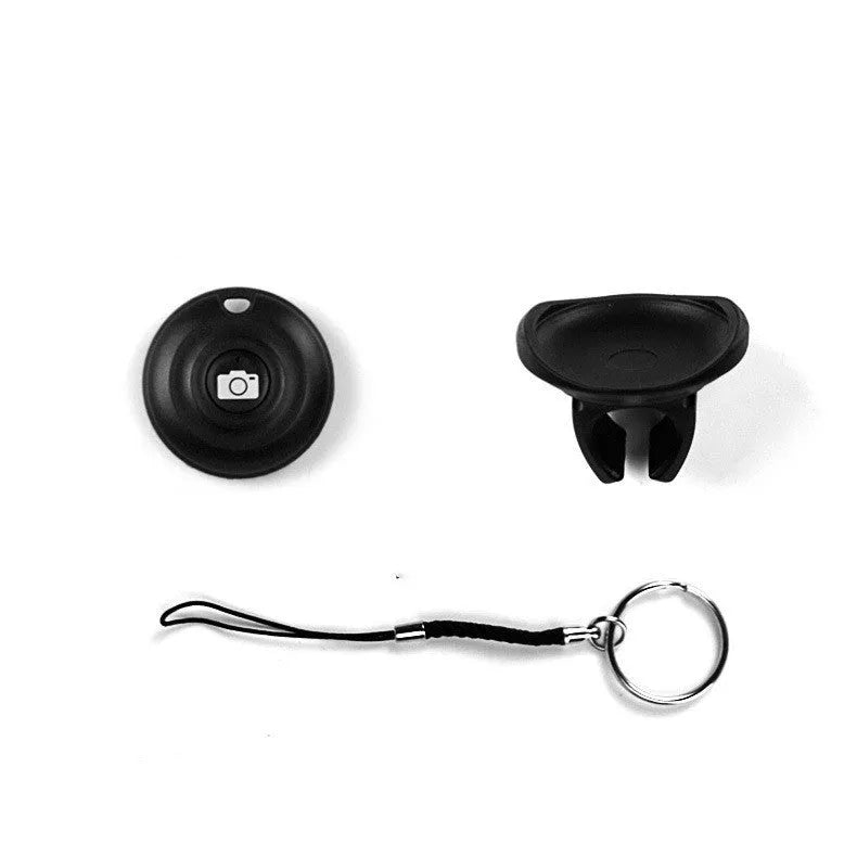 Black Snap Bluetooth remote control for wireless smartphone camera shutter, shown on a white background.