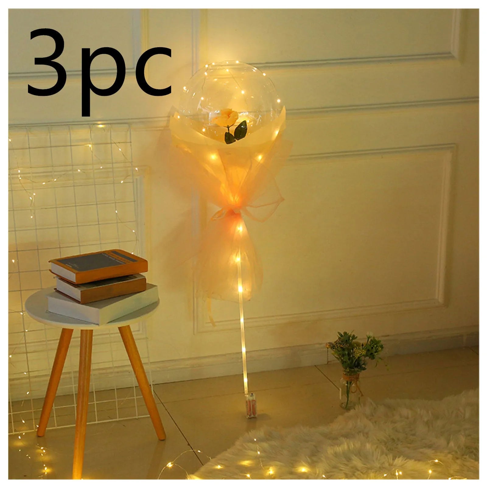 Transparent LED luminous balloon with artificial rose and built-in light, shown as a DIY bouquet kit.