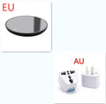 Black coffee cup warmer plate with temperature switch on desk next to mug