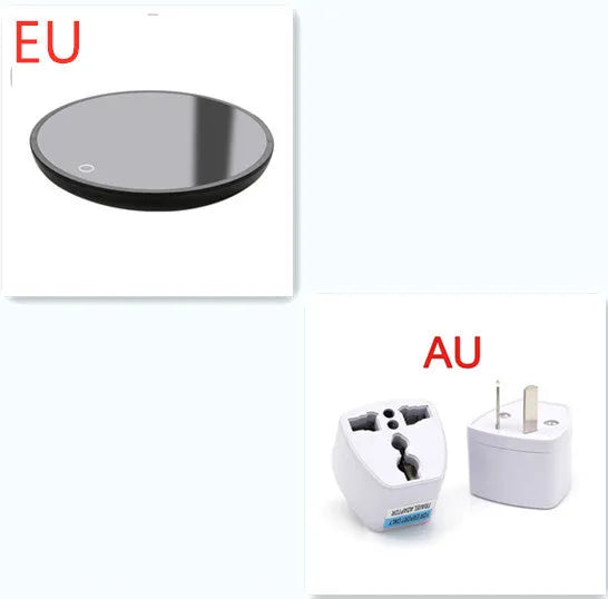 Black coffee cup warmer plate with temperature switch on desk next to mug