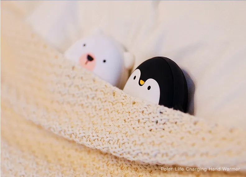 Cartoon penguin polar bear USB rechargeable hand warmer power bank showing black, white, and black-white colour options
