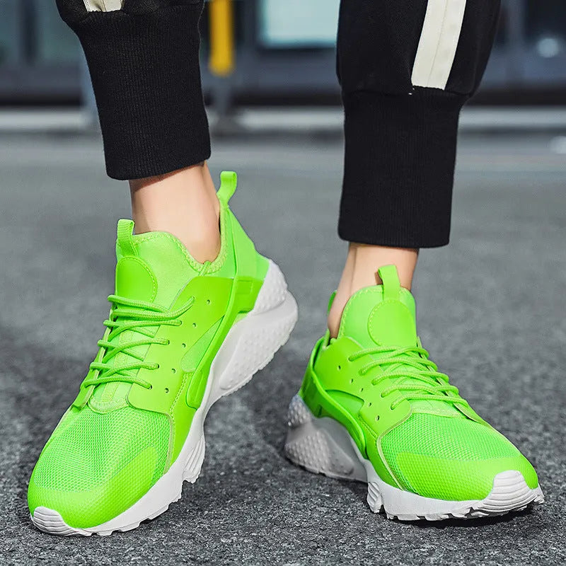 Men's fluorescent casual sneakers with mesh upper, cross shoulder straps and flat sole.