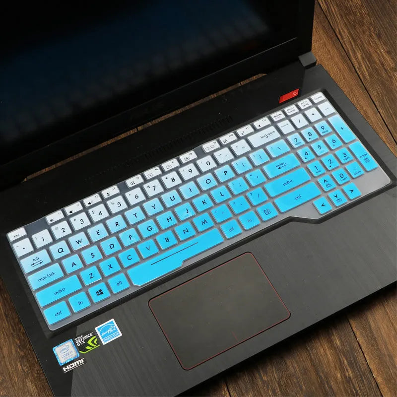 Transparent silicone keyboard protective film for ASUS Flight laptop on a keyboard.