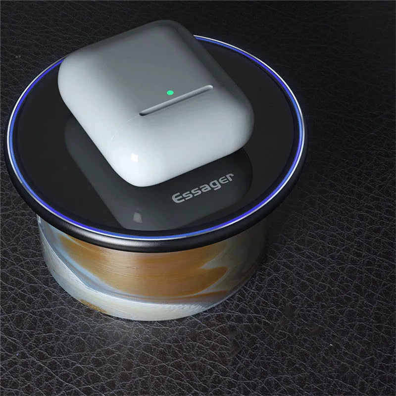 Black and white aluminium wireless charger showing LED indicator lights and anti-slip surface
