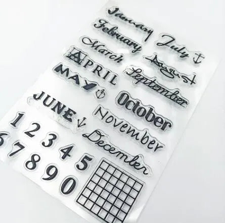 Vintage icon seal calendar stamp in transparent silicone on a crafting surface.