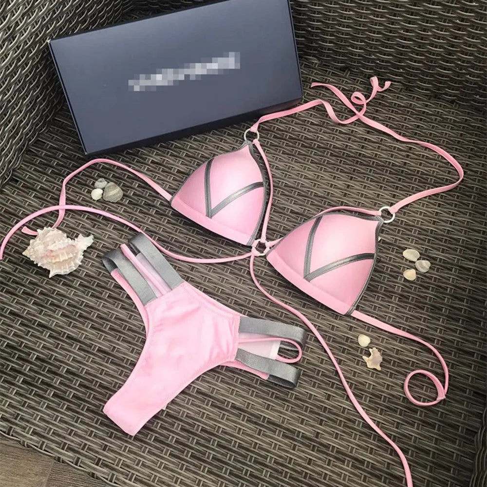 Women's soft cup bikini top with removable pads in various colours including black, blue, and animal prints.