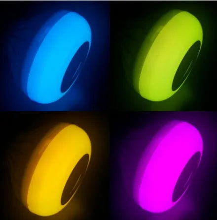 White Bluetooth speaker LED bulb with E27 screw base and remote control for 16 colour lighting.