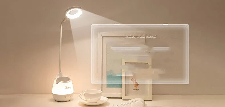 Green USB rechargeable touch table lamp with LED light source on a wooden desk.