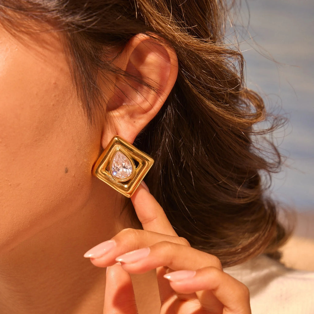 Gold geometric water drop zircon stud earrings with butterfly back fastenings