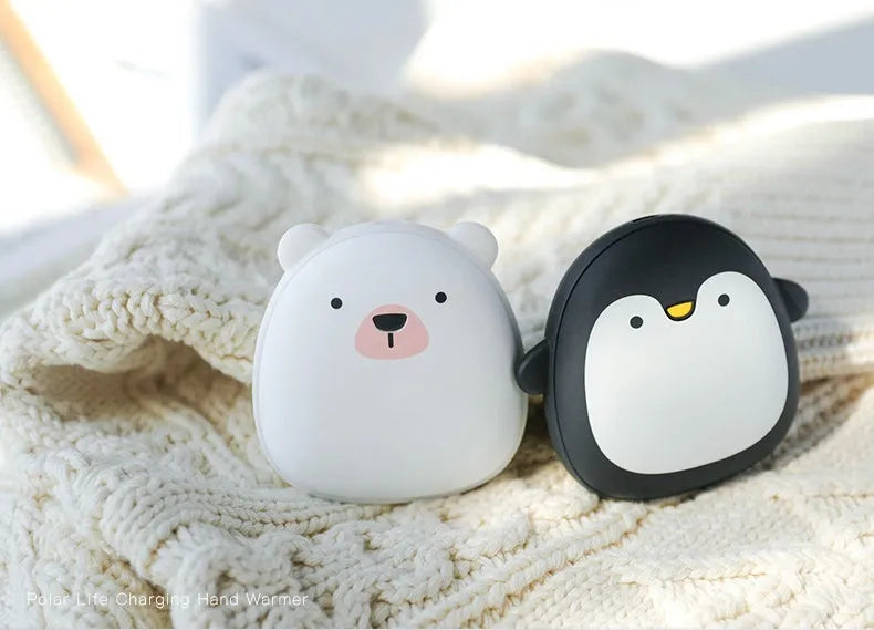 Cartoon penguin polar bear USB rechargeable hand warmer power bank showing black, white, and black-white colour options