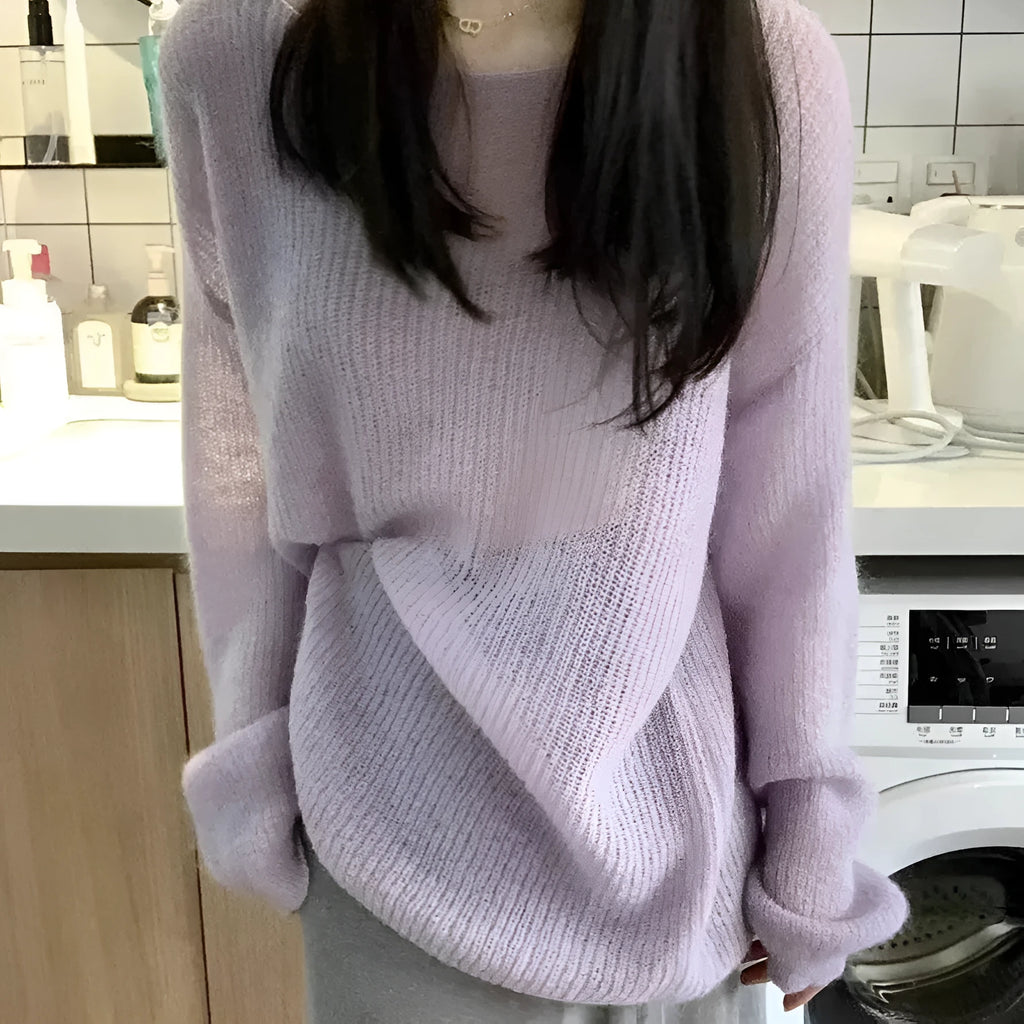 Purple lightweight women's blouse with hollow-out pattern and flared princess sleeves on a mannequin.