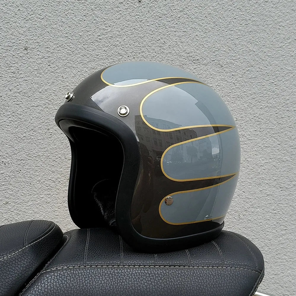 Retro-style half helmet for motorcycles with a fibreglass shell shown in a cement grey colour.