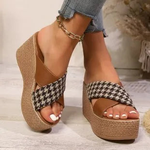 Casual brown plaid wedge sandals with a cross leopard pattern and a rubber sole.