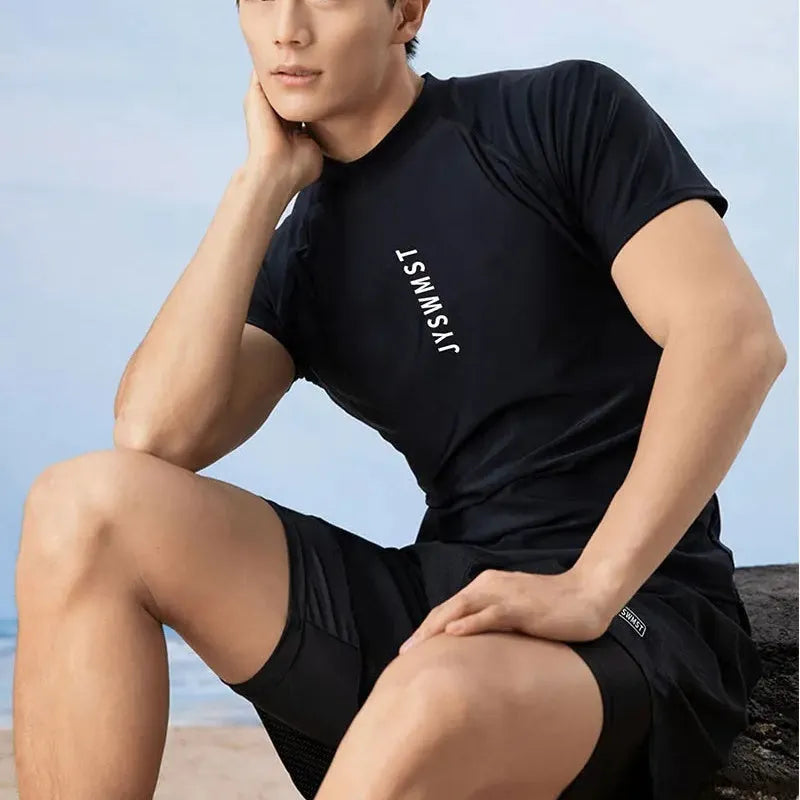 Men's patterned two-piece swimsuit set showing top and trousers on a size chart background.