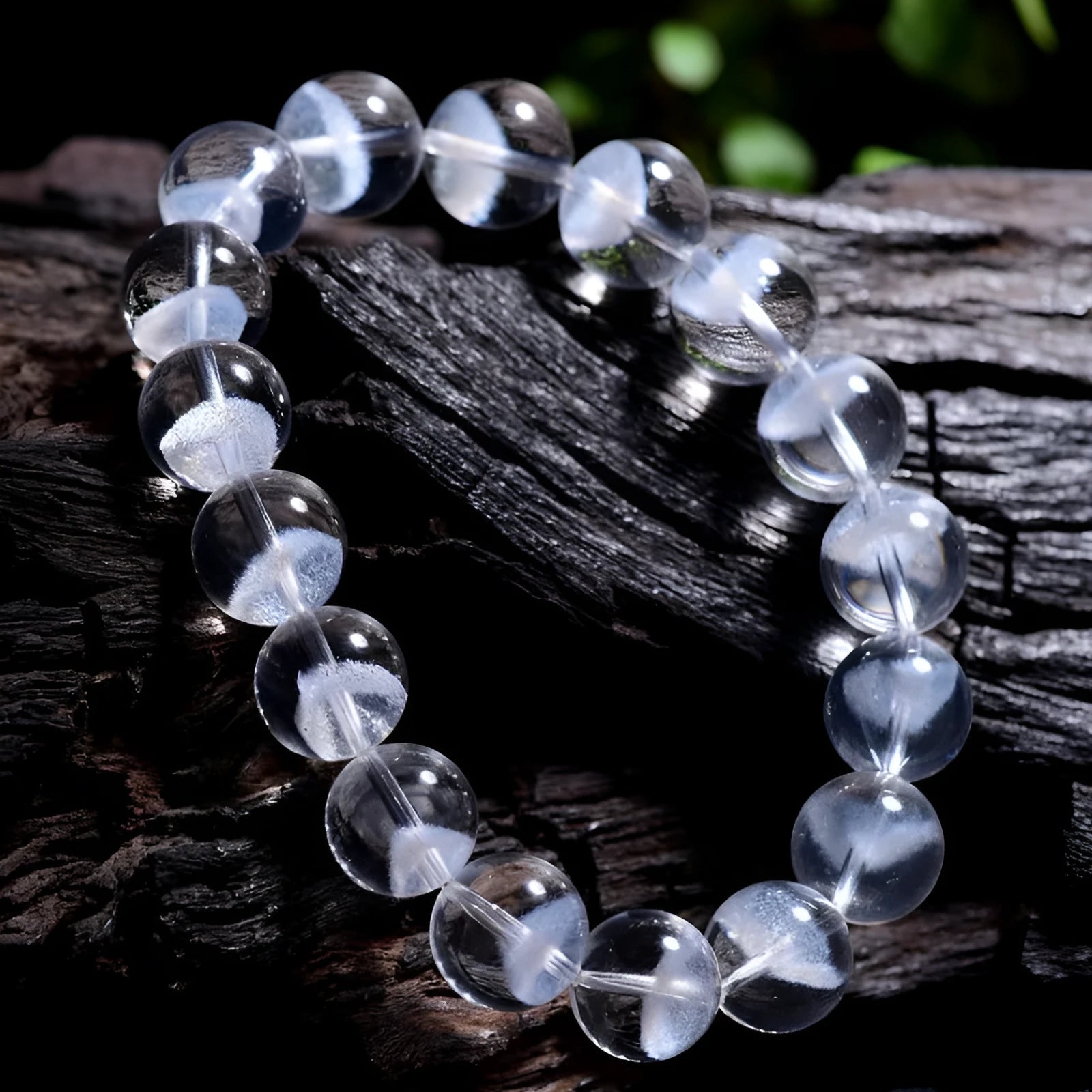 Women's white crystal pyramid bracelet with traditional Ruyi element design showing multiple bead sizes
