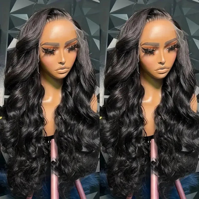 A black synthetic wig with long, medium-large waves, shown on a mannequin head.
