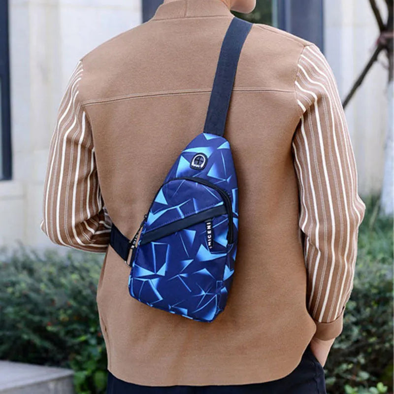 Men's Oxford cloth crossbody chest bag with earphone hole, showing zipper closure and vertical messenger style