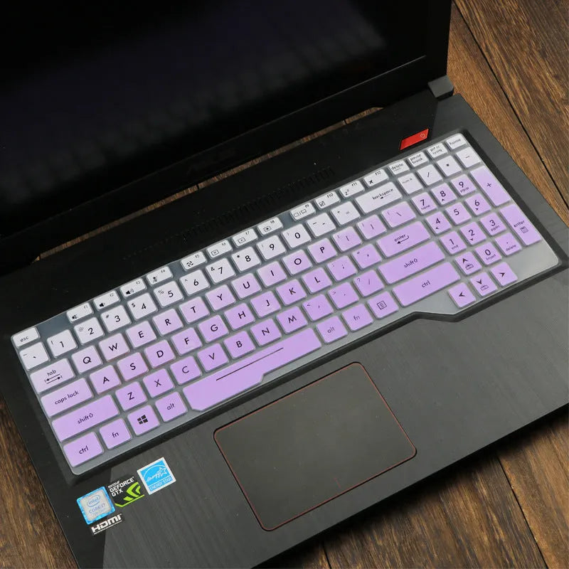 Transparent silicone keyboard protective film for ASUS Flight laptop on a keyboard.