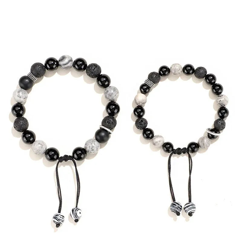 A black agate map stone volcanic rock bracelet with diamond-shaped beads in a New Chinese style unisex design.