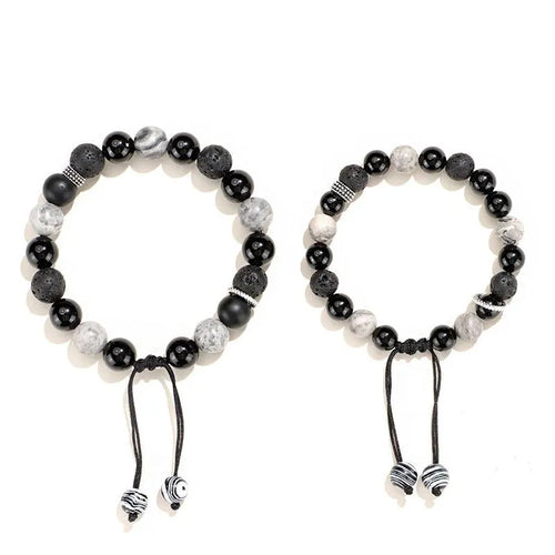 A black agate map stone volcanic rock bracelet with diamond-shaped beads in a New Chinese style unisex design.