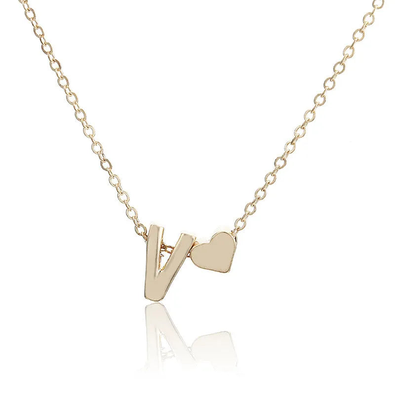 Gold and silver alloy peach heart shaped letter pendant necklace on a chain
