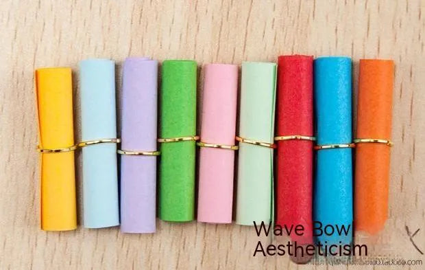 Multi-coloured mini paper scrolls with metal eyelets in 3x7cm, 4x7cm, 5x5cm, and 7x7cm sizes for drift bottle messages