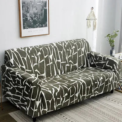 Geometric print polyester sofa slipcover stretched over sofa with matching pillowcase