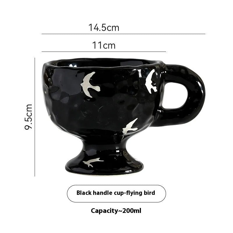 Hand-pinched irregular ceramic mug with solid colour design, approximately 14.5cm tall