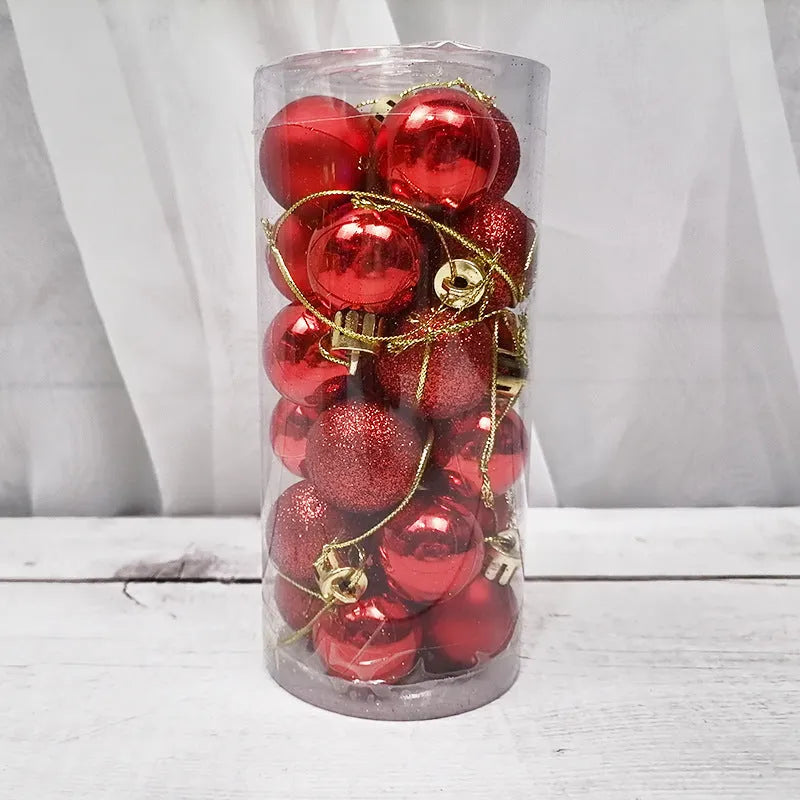 Shiny matte gold, red, silver, and blue 3 cm Christmas baubles spilling from a cardboard box.