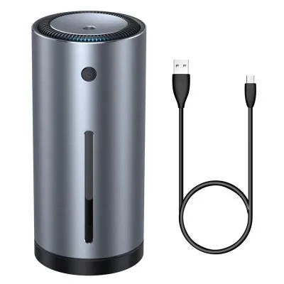 Black aluminium alloy car diffuser humidifier with air purification function on a desktop.