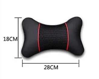 Car headrest neck pillow in black red colour with green leather exterior on a car seat