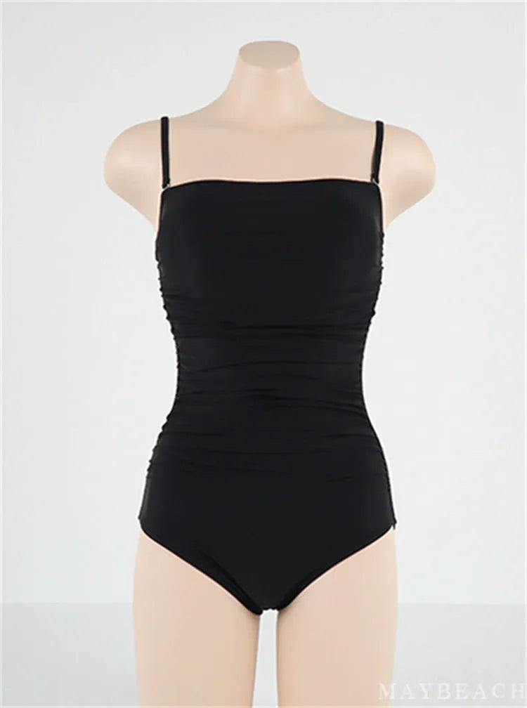 Sling style belly pleated one-piece swimsuit in slim fit available in blue, white, yellow, black colours