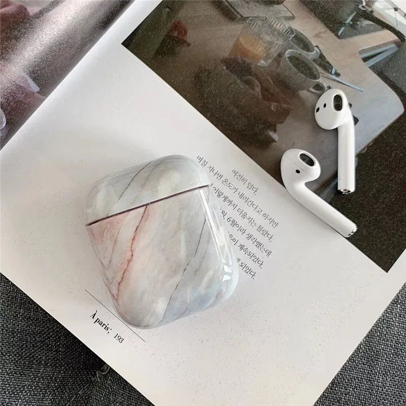 White marble pattern hard protective case for AirPods 1 and AirPods 2 wireless charging box.