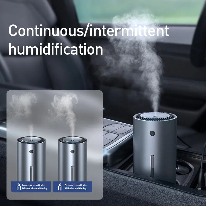 Black aluminium alloy car diffuser humidifier with air purification function on a desktop.