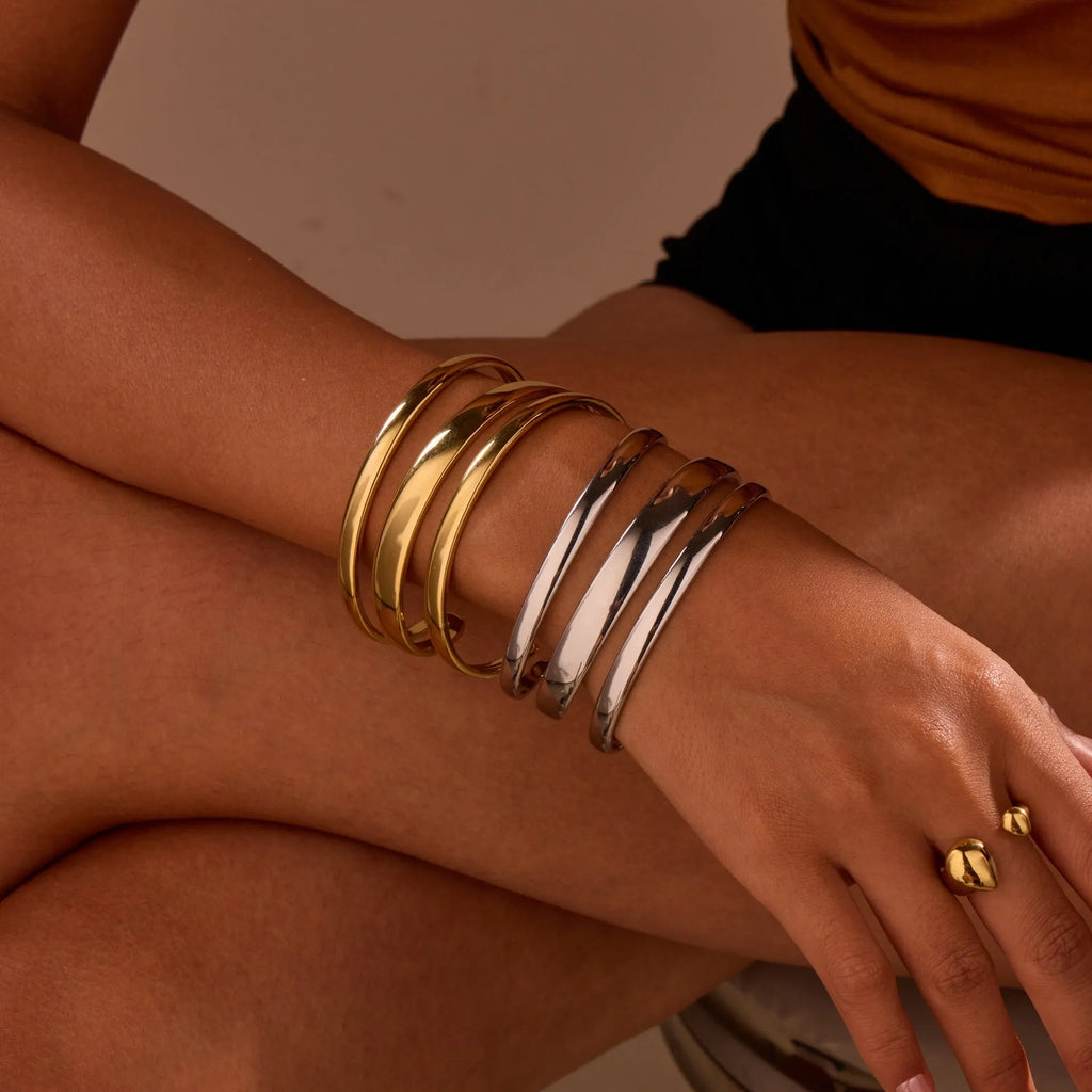 Women's geometric stainless steel bracelet with 18K gold electroplating in simple opening design