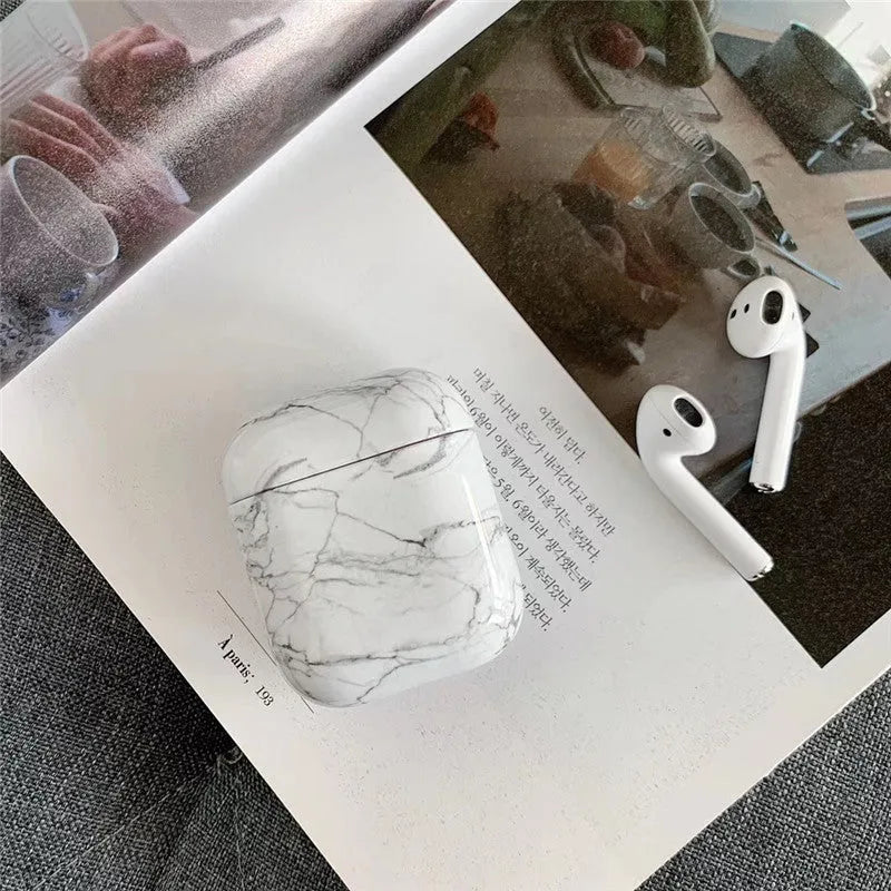 White marble pattern hard protective case for AirPods 1 and AirPods 2 wireless charging box.