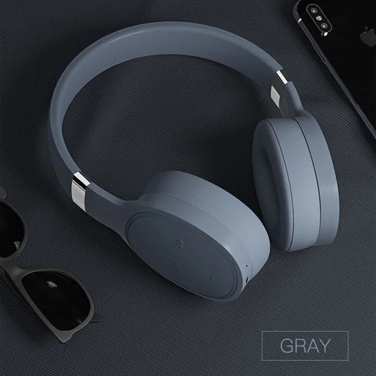 Wireless Bluetooth over-ear headset shown in black, blue, grey, or white colour options.