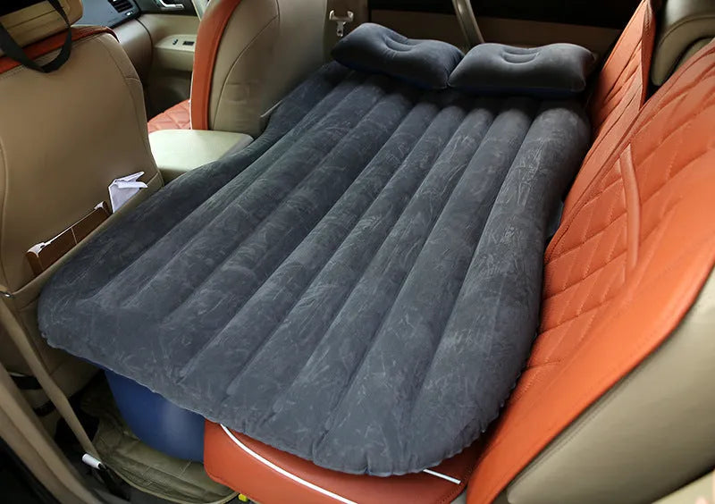 Thick flocking inflatable car air bed set with pump and pillows for five-seater vehicles.