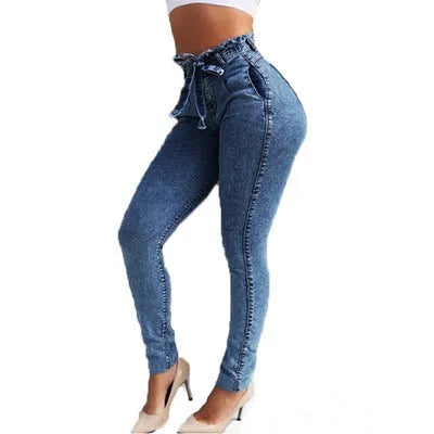 Pair of straight-leg jeans with a frayed fringed hem detail, shown in light blue denim.
