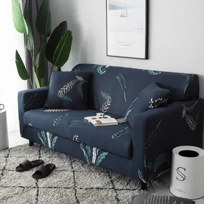 Geometric print polyester sofa slipcover stretched over sofa with matching pillowcase