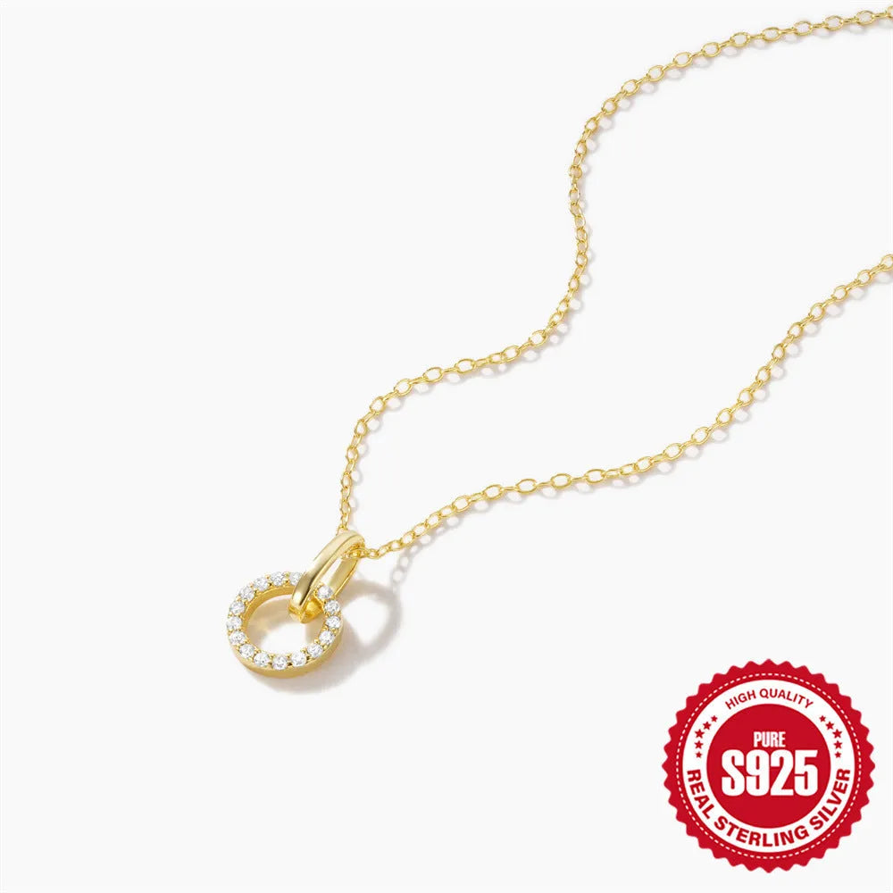 Gold-coloured geometric pendant on adjustable sterling silver clavicle chain necklace