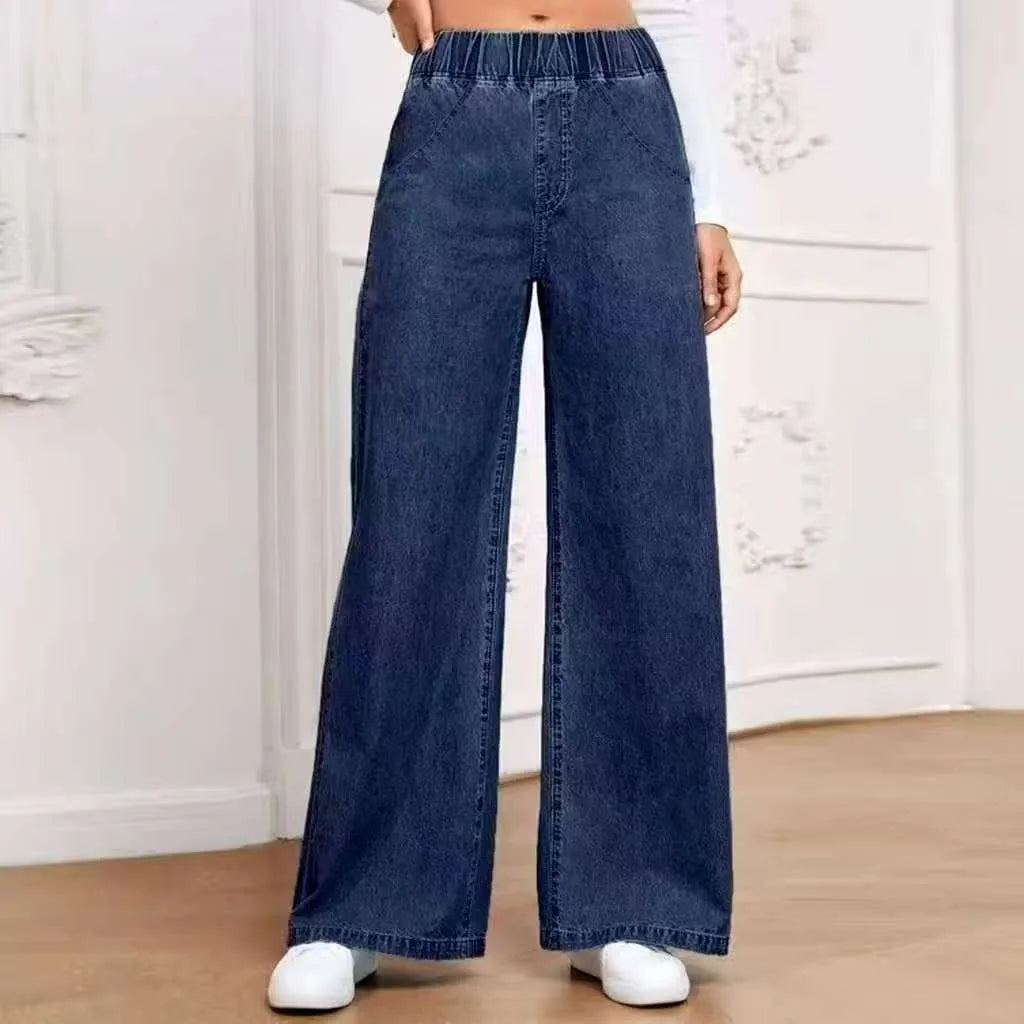 Light blue washed wide-leg denim trousers for plus size women with straight fit and mid-rise waist