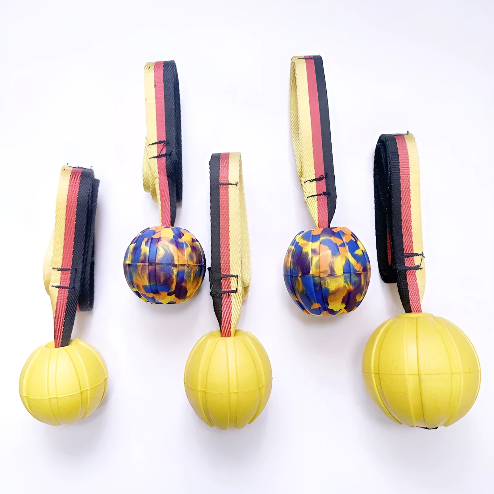 EVA floating pet tetherball toy in yellow and camouflage colours with string attachment