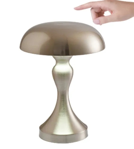 Bronze LED desk lamp with touch control showing three colour temperature settings on wooden desk