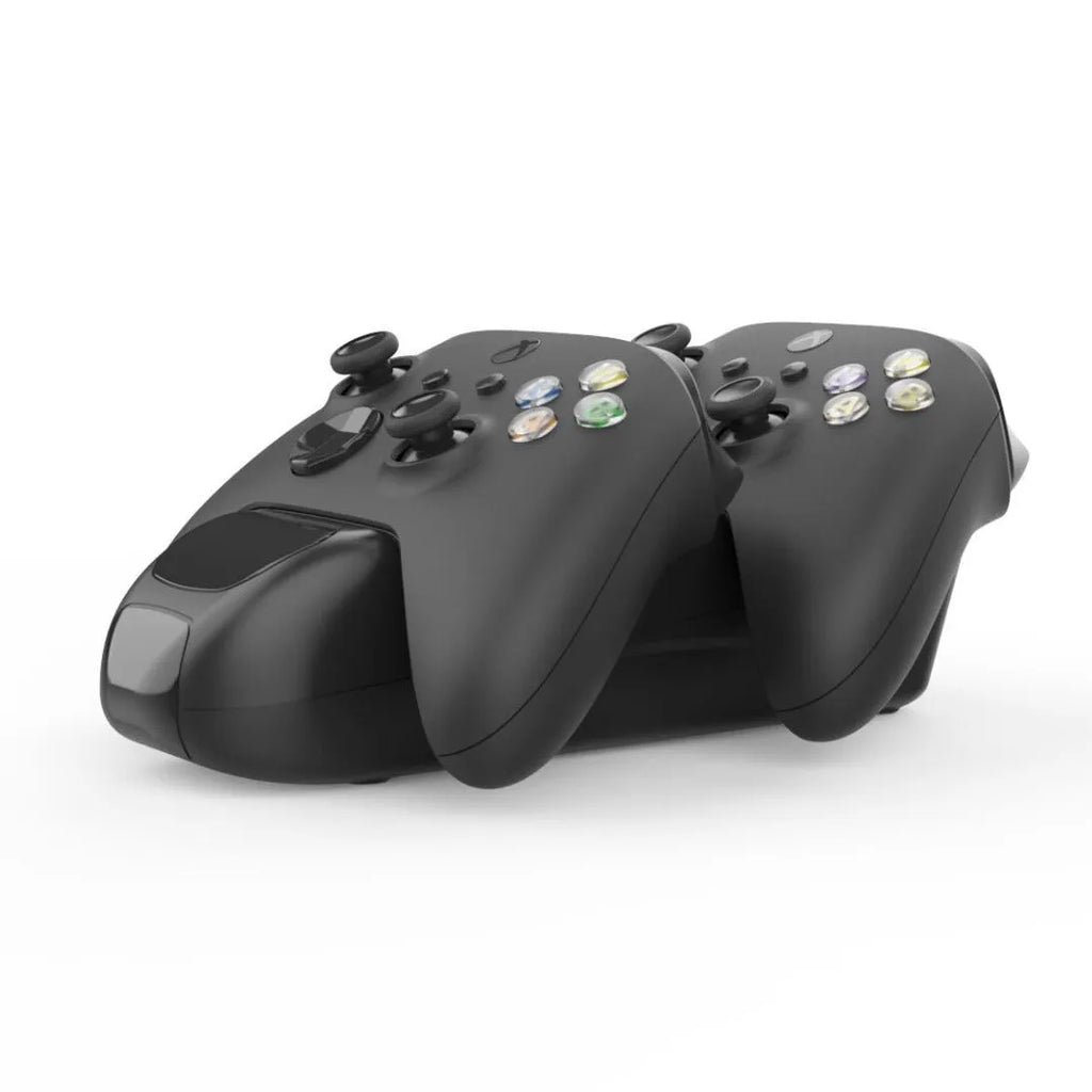 Black wireless charging station for two Xbox Series X controllers with LED lights, showing included rechargeable battery packs.