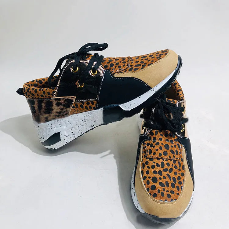 Women's casual suede sneakers with wedge heel in black, leopard, panther, pink, and snake pattern colours