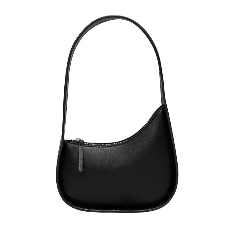 Small half moon shaped leather shoulder bag with wide strap in four colour options