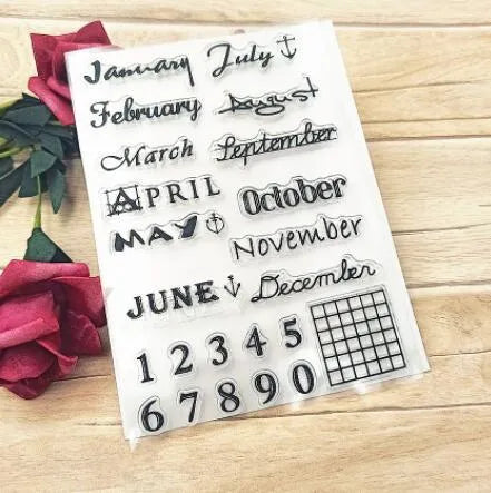 Vintage icon seal calendar stamp in transparent silicone on a crafting surface.